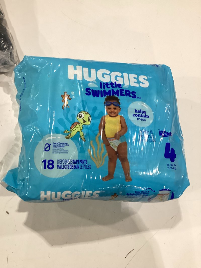 Condition photo showing New/Like New for huggies little swimmers disposable swimming diapers, size 4 (24-34 lbs), 18 ct size 4 18