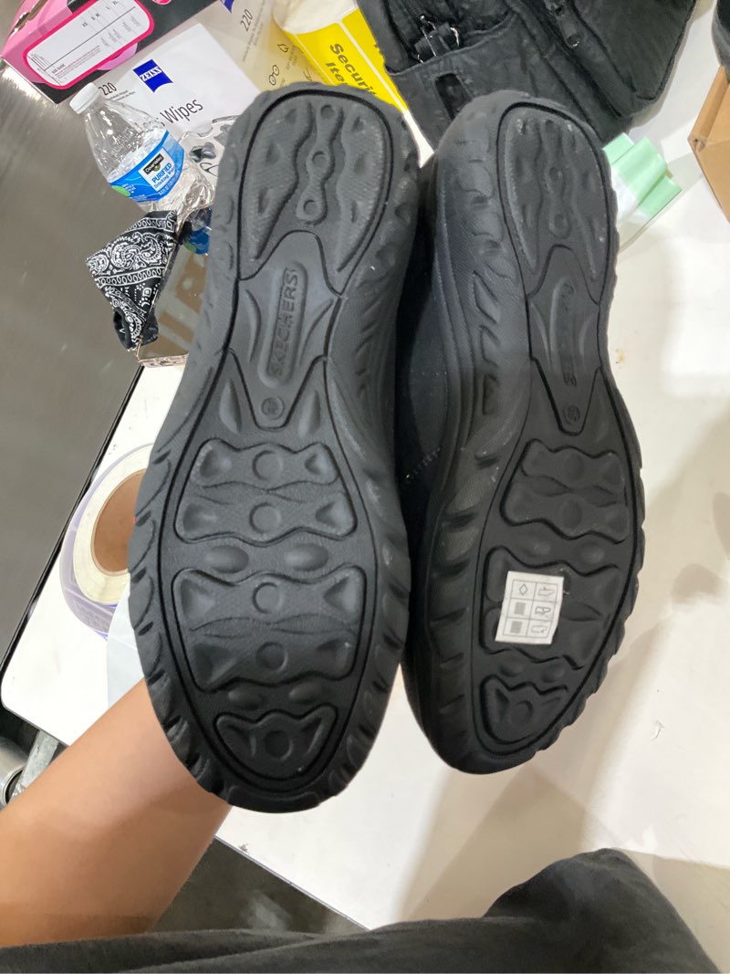 Condition photo showing As Is for Skeckers slip in 7.5