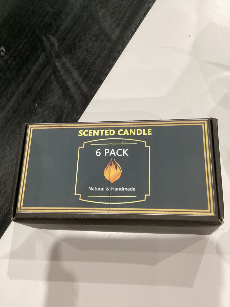 Condition photo showing New/Like New for 6 pack scented candles 
