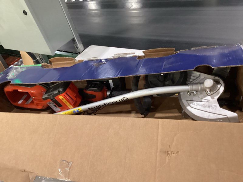 Condition photo showing As Is for USED Husqvarna 330iKE Combi Switch + Lawn Edger Attachment, Electric Edger with Battery and Charger Included, 970701202