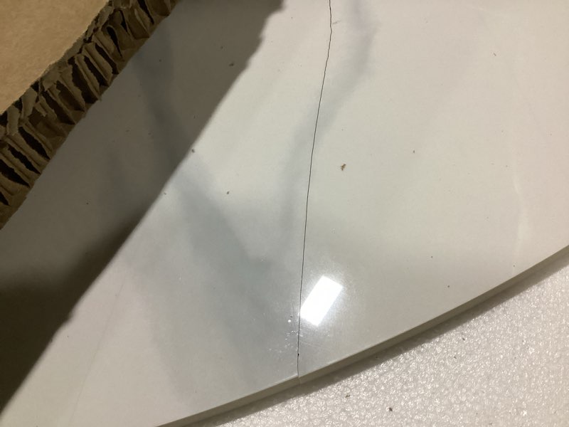 Condition photo showing As Is for 66x66x8 cracked possibly used granet table top.