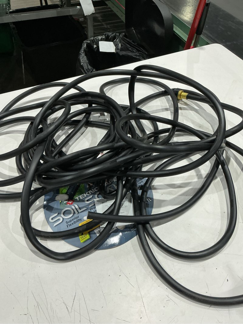 Condition photo showing As Is for teknor apex soil soaker 3/8-in x 50-ft vinyl black coiled hose