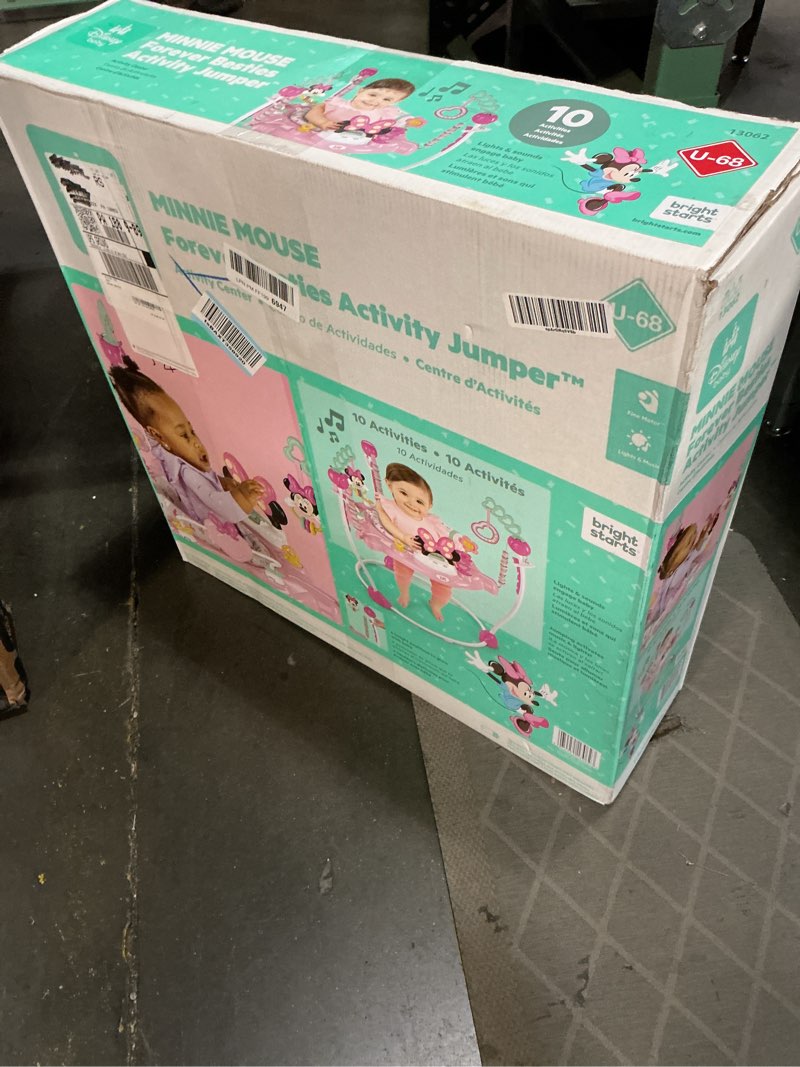 Condition photo showing New/Like New for bright starts disney baby minnie mouse forever besties baby activity center jumper with 10 toys, lights & sounds, 360-degree seat, 6-12 months (pink)