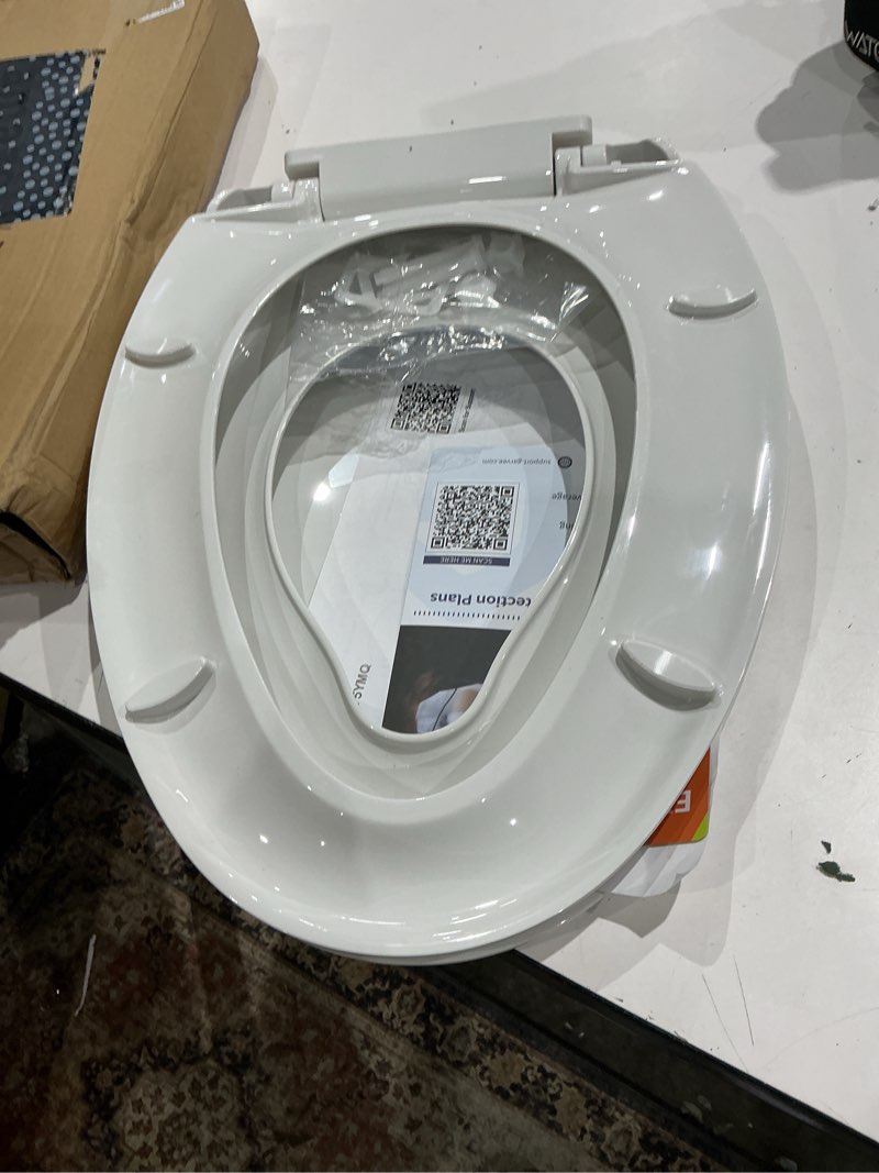 Condition photo showing Good Condition for elongated toilet seat with built in potty training seat, potty training toilet seat for toddlers, magnetic kids seat and cover, slow close and never loosen, fits both adult and child, white, 19" white 19" elongated with toddler seat