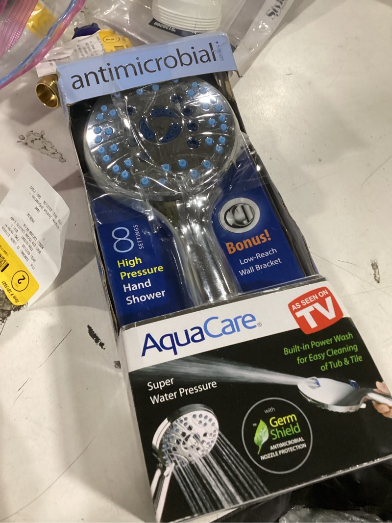 Condition photo showing As Is for aquacare 8-settings chrome 4.2-in round handheld shower head 2.5 gpm