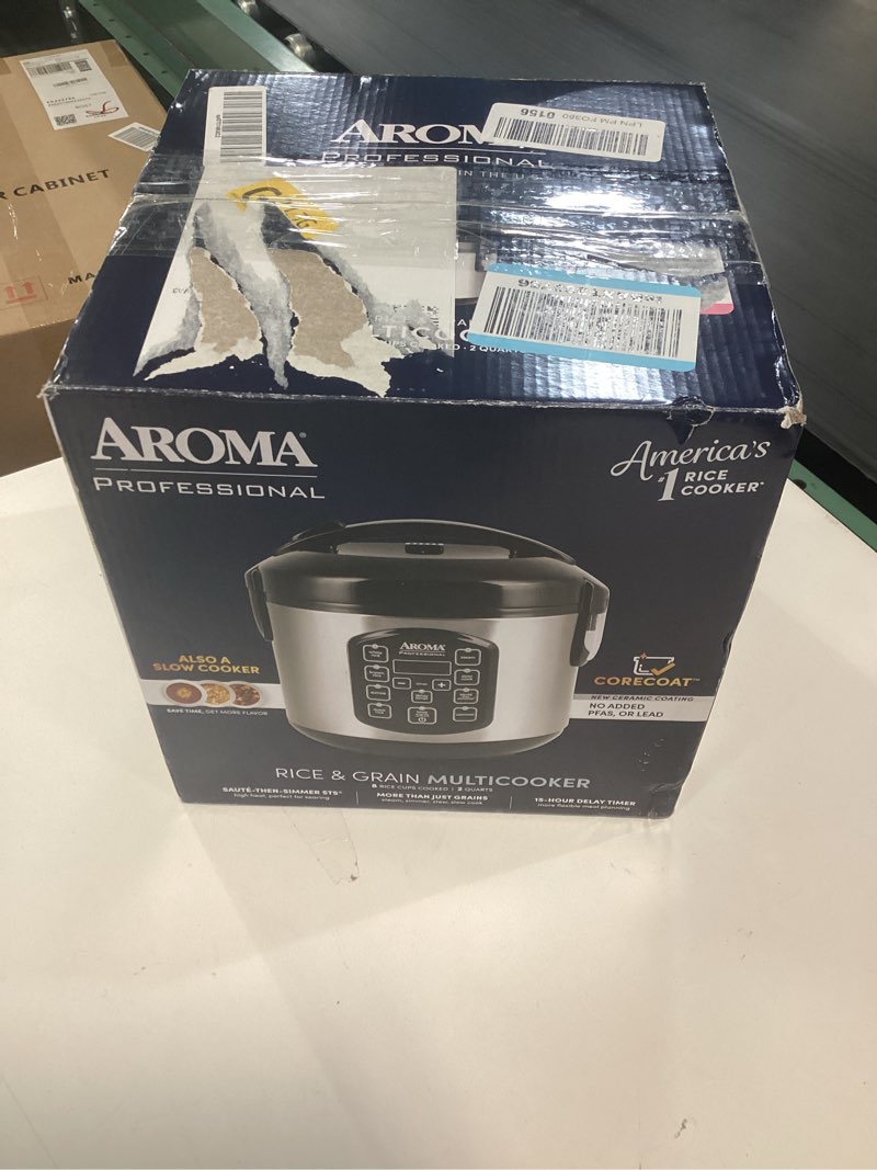 Condition photo showing New/Like New for aroma professional digital rice cooker, multicooker, 4-cup (uncooked) / 8-cup (cooked), steamer, slow cooker, oatmeal cooker, sts, auto keep warm, 2 qt, stainless steel exterior, arc-954sbd 4-cup uncooked rice