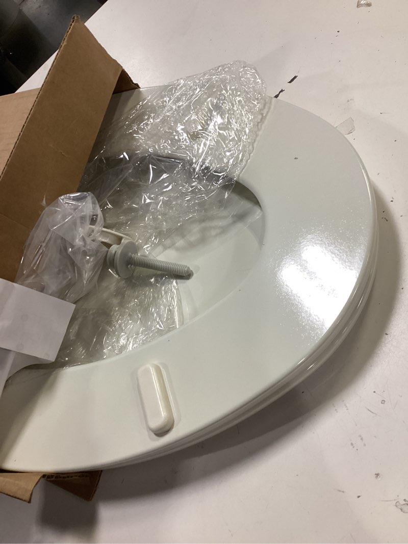 Condition photo showing As Is for bemis elongated enameled wood toilet seat in biscuit with easy•clean? hinge