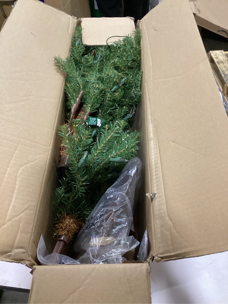 Condition photo showing As Is for National Tree Company 5 ft Pre-Lit Hickory Cedar Artificial Christmas Tree, 150 Clear Lights, 371 Tips, Metal Plate Base, Green 5ft Tree