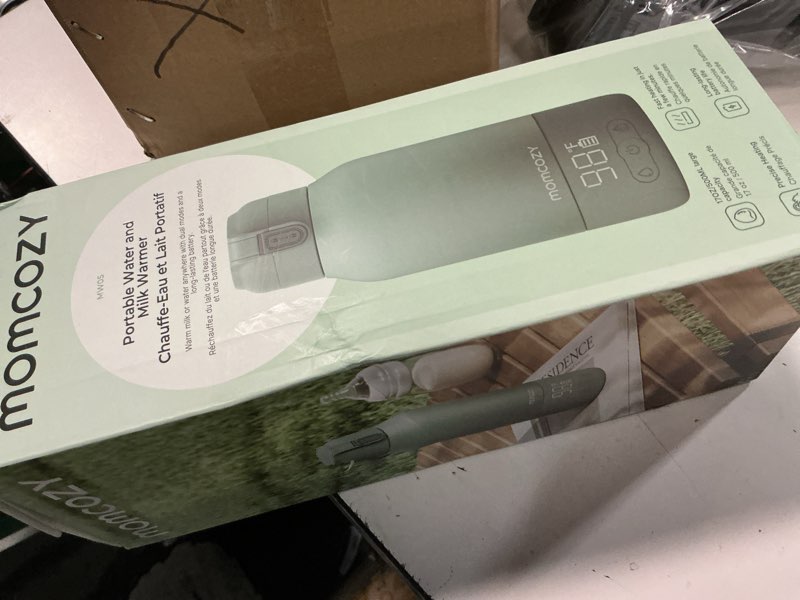 Condition photo showing New/Like New for momcozy portable bottle warmer for travel – dual heating modes for breast milk & water, portable milk warmer with fast heating & long battery life, 17 ounces large capacity to meet your all-day needs gradual change of green