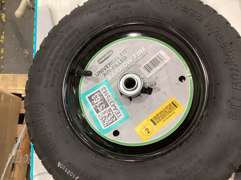 Condition photo showing As Is for 14.5 in. pneumatic universal wheelbarrow wheels