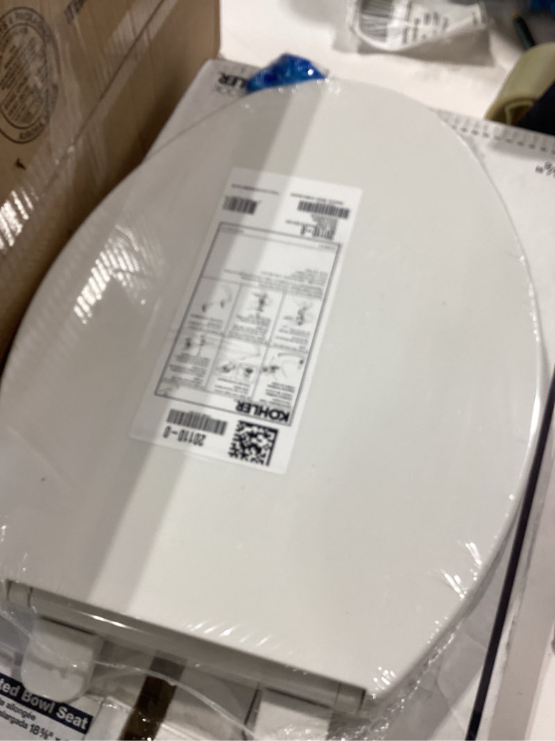 Condition photo showing New/Like New for kohler 20110-0 brevia, slow close toilet seat, elongated toilet seat, grip-tight bumpers quick-attach hardware, white white elongated quiet-close