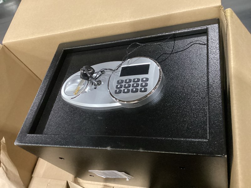 Condition photo showing As Is for Amazon Basics Steel Security Safe and Lock Box with Electronic Keypad, for Cash, Jewelry, Documents, Black, 0.5 Cubic Feet, 13.8" W x 9.8" D x 9.8" H