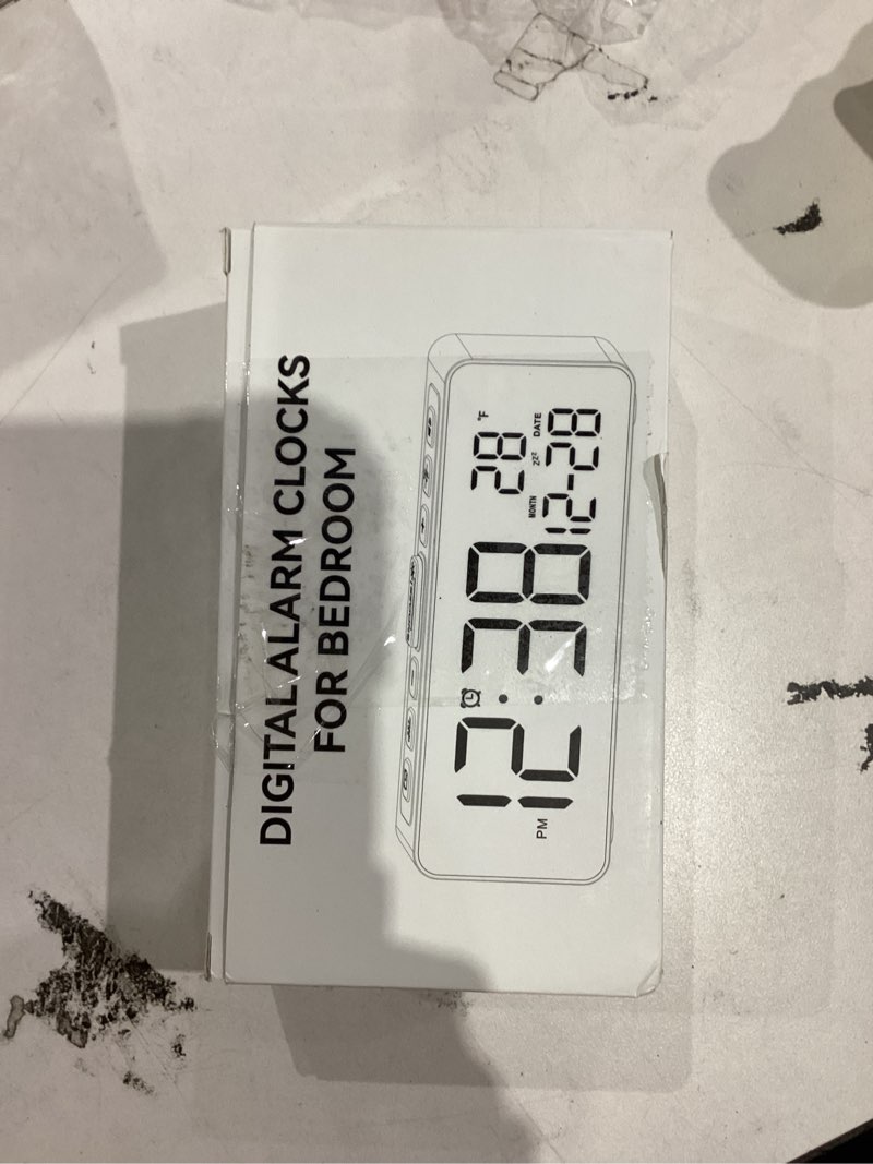 Condition photo showing New/Like New for Netzu 3-in-1 Digital Clocks for Living Room with Temperature, Date & Time Display - 4 Levels Birghtness, 3 Volumes, Small & Compact Plug-in Alarm Clock for Bedroom, Office (Black)