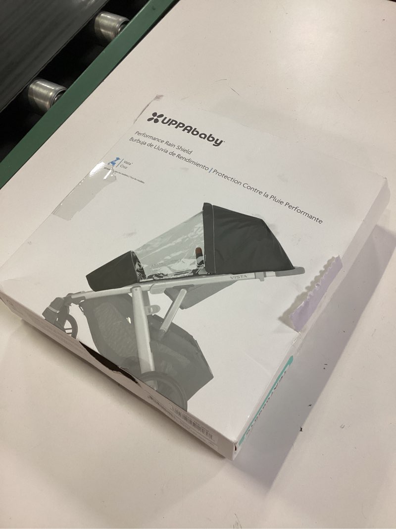 Condition photo showing New/Like New for uppababy performance rain shield for vista and cruz strollers / waterproof and windproof coverage / ventilated design / quick attachment / easy access to child 1 count (pack of 1) shield