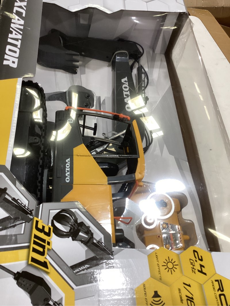 Condition photo showing Good Condition for DOUBLE E Volvo RC Excavator 17 Channel 3 in 1 Construction Toys, 17 Channel Remote Control Vehicles Tractor Sandbox Toys Digger with Metal Shovel Drill Grab RC Truck for Kids Adults