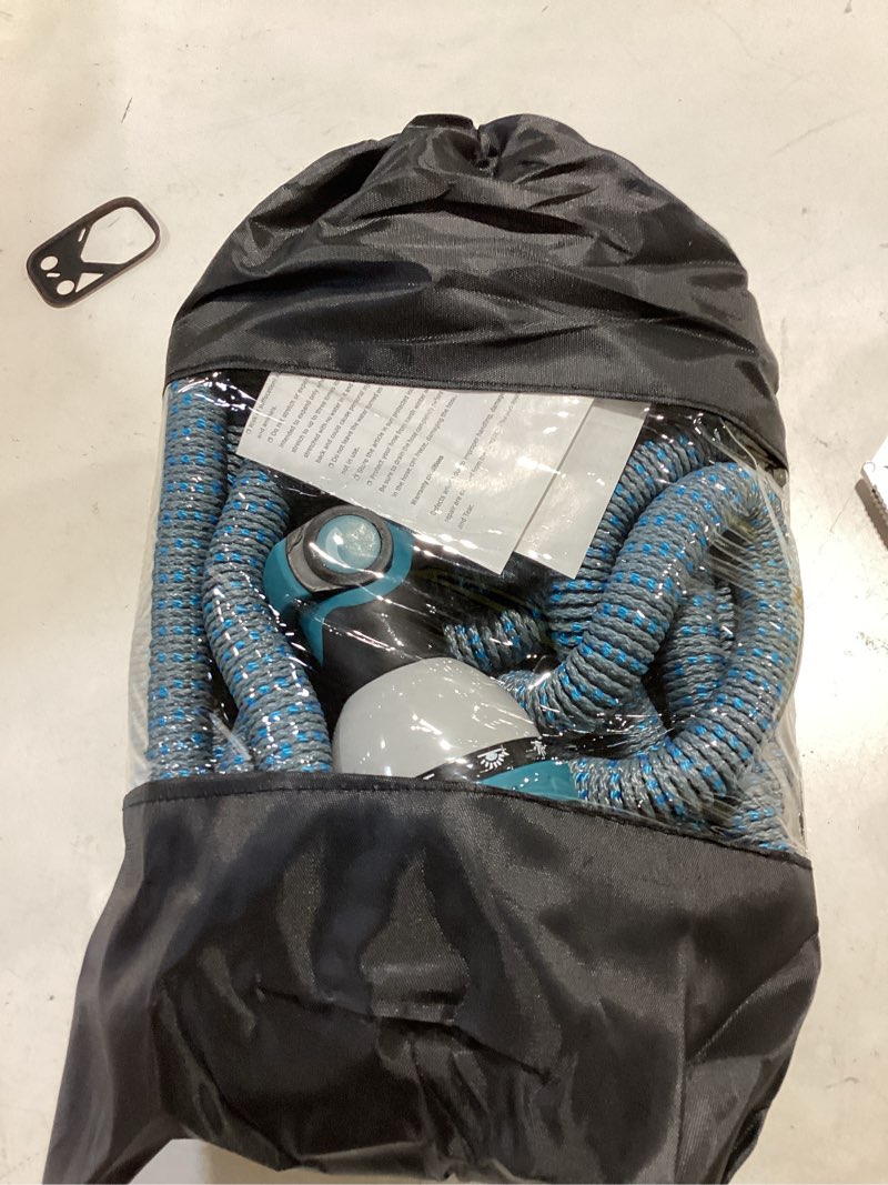 Condition photo showing As Is for 100 ft expandable garden hose - kink free flexible water hose 100ft with 10 pattern spray nozzle, 3/4 solid brass connectors, retractable latex core - lightweight expanding hose blue 100ft