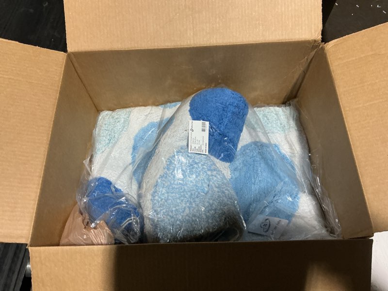 Condition photo showing Good Condition for bath rug 100% soft cotton, size 50x30 inch, latex spray non-skid backing, multiple blue color pebble stone pattern, machine washable