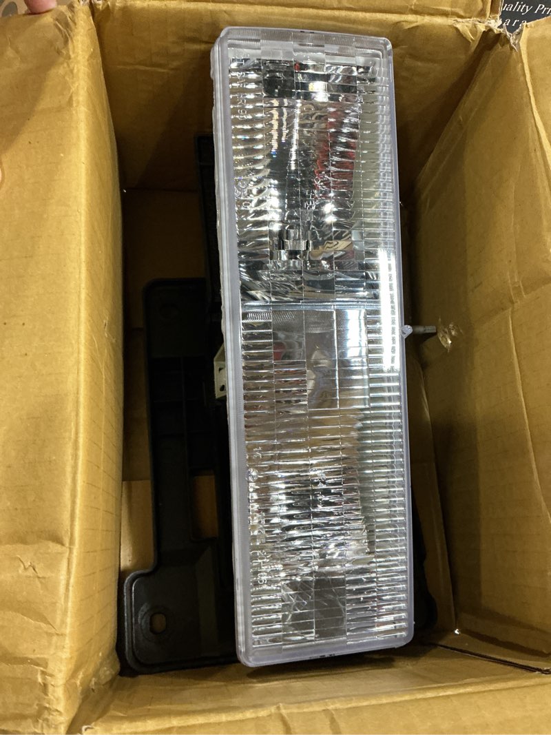 Condition photo showing Good Condition for TYC Left Headlight Assembly Compatible with 1994-2002 Chevrolet GMC C/K