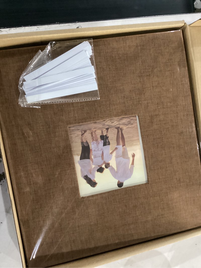 Condition photo showing New/Like New for potricher linen hardcover photo album 4x6 600 photos large capacity for family wedding anniversary baby vacation (brown, 600 pockets) 600 pockets brown