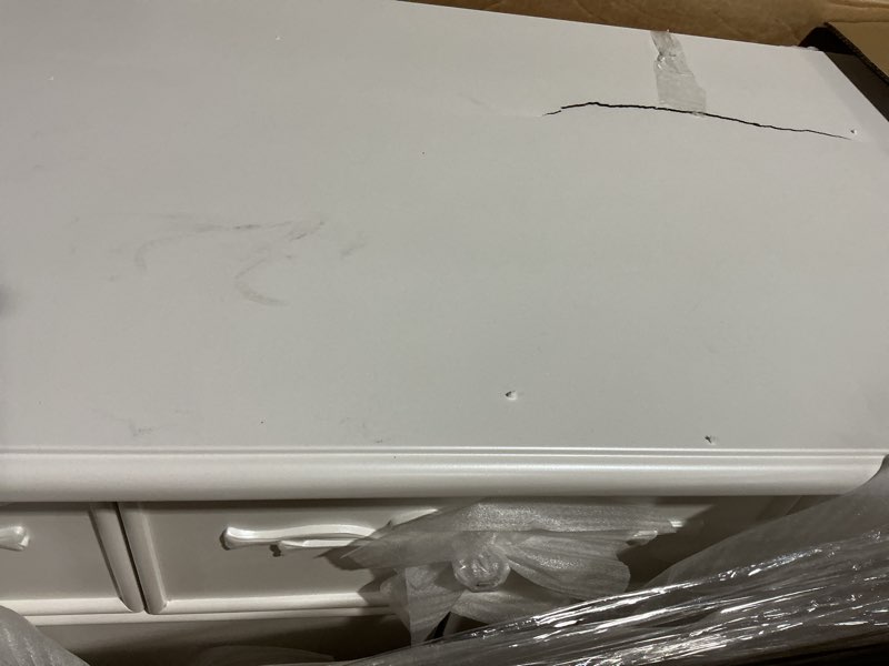 Condition photo showing As Is for évolur aurora 7-drawer double dresser, assembled baby dresser with crystal knobs, queen anne feet & spacious storage for nursery essentials in frost white