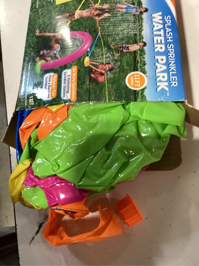 Condition photo showing As Is for banzai splash 11ft outdoor family water park with water-sprinkling stations