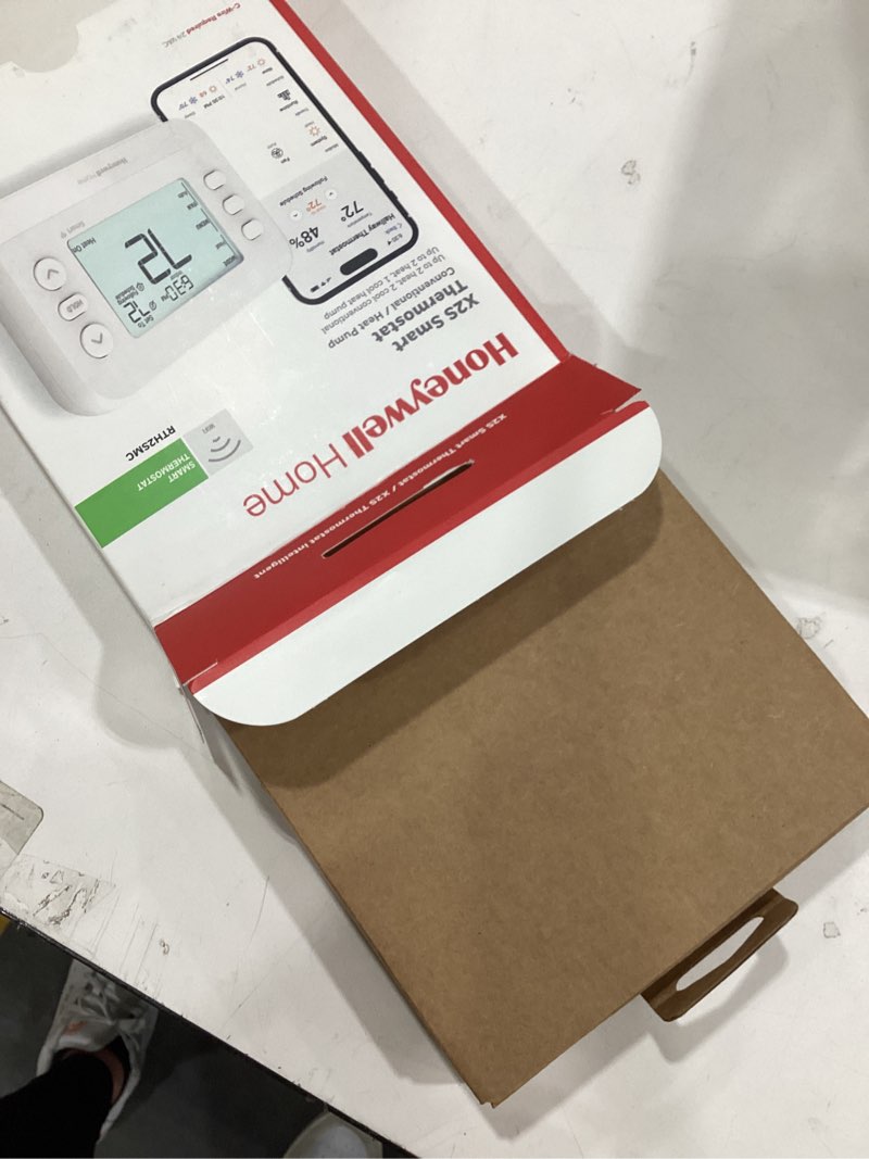 Condition photo showing As Is for Honeywell home xs2 thermostat