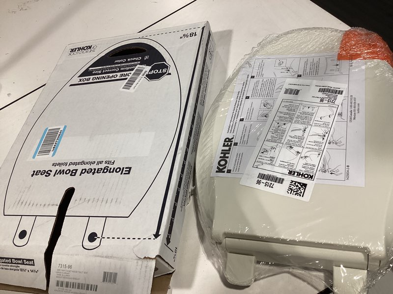 Condition photo showing New/Like New for kohler k-7315-96 cachet quick-release elongated toilet seat, quick attach hardware, easy to clean, color-matched plastic hinges, biscuit elongated biscuit