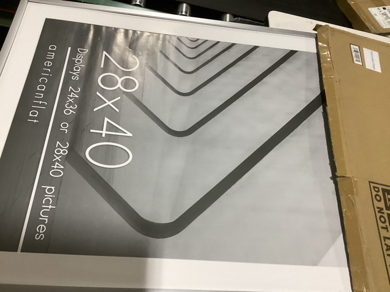 Condition photo showing Good Condition for americanflat 28x40 poster frame with polished plexiglass - use as 24x36 frame with mat or display 28x40 photo without mat - streamline collection - thin border picture frames for wall - silver silver 28x40 1 pack