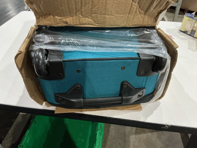 Condition photo showing Good Condition for u.s. traveler rio lightweight softside rolling carry-on suitcase, 2-wheel set, teal teal 2-wheel set (21"/14")