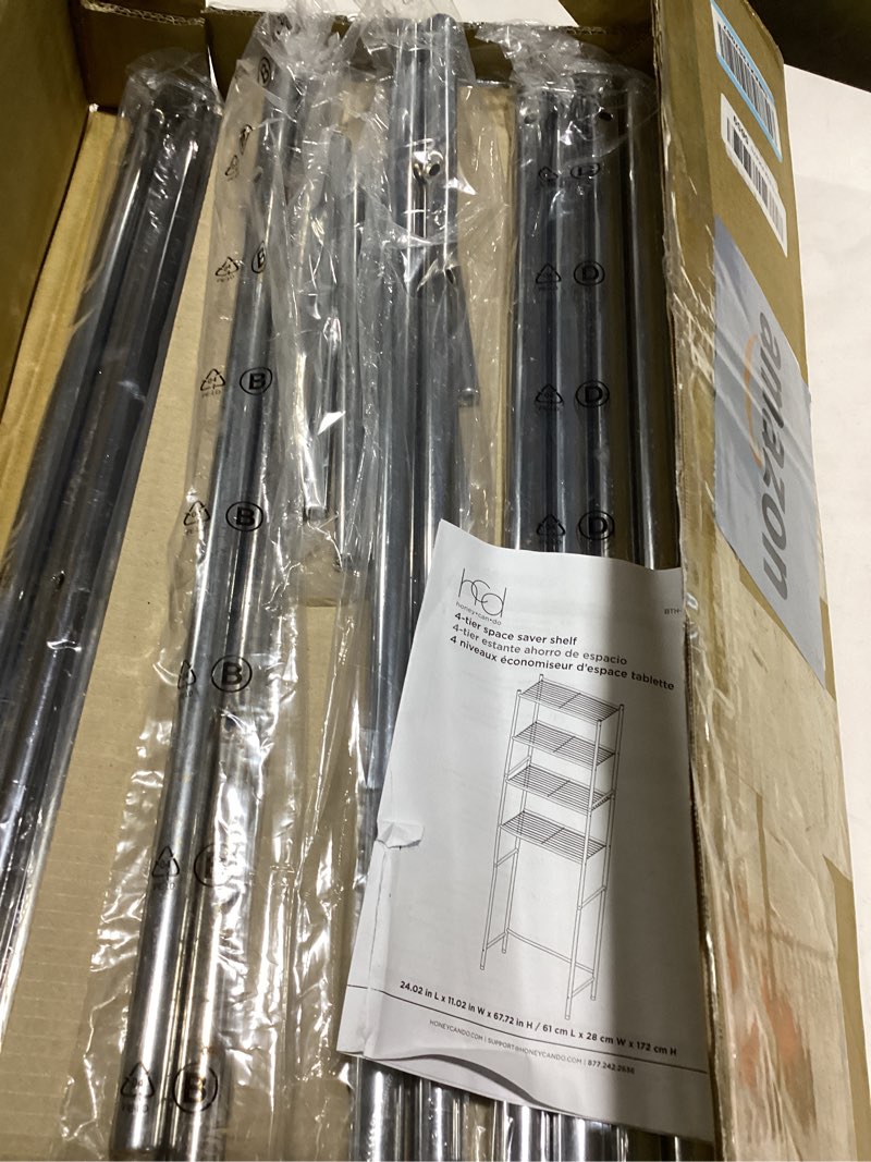 Condition photo showing Good Condition for Honey-Can-Do 4-Tier Over-The-Toilet Storage Shelf - Space-Saving Steel Bathroom Restroom Organizer with Neutral Chrome Finish, Ideal for Towels, Toiletries, & Essentials - 24"W x 68"H x 11"D