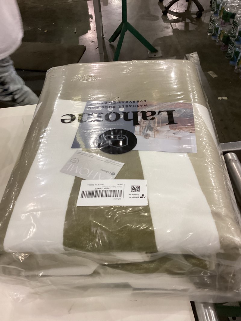 Condition photo showing New/Like New for Lahome Green Area Rug: 5'x7 'Ultra-Thin Machine Washable & Non-Slip with Cute Boho Rainbow Sun Print for Living Room, Nursery, Bedroom, Entryway & Office Rainbow Sun Green (Transverse) 5' x 7' (Rectangular)