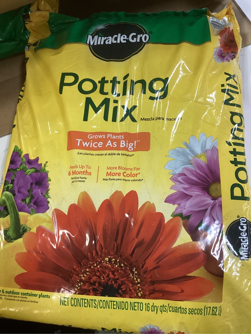 Condition photo showing New/Like New for miracle-gro potting mix  for container plants  flowers  shrubs  16 qt.