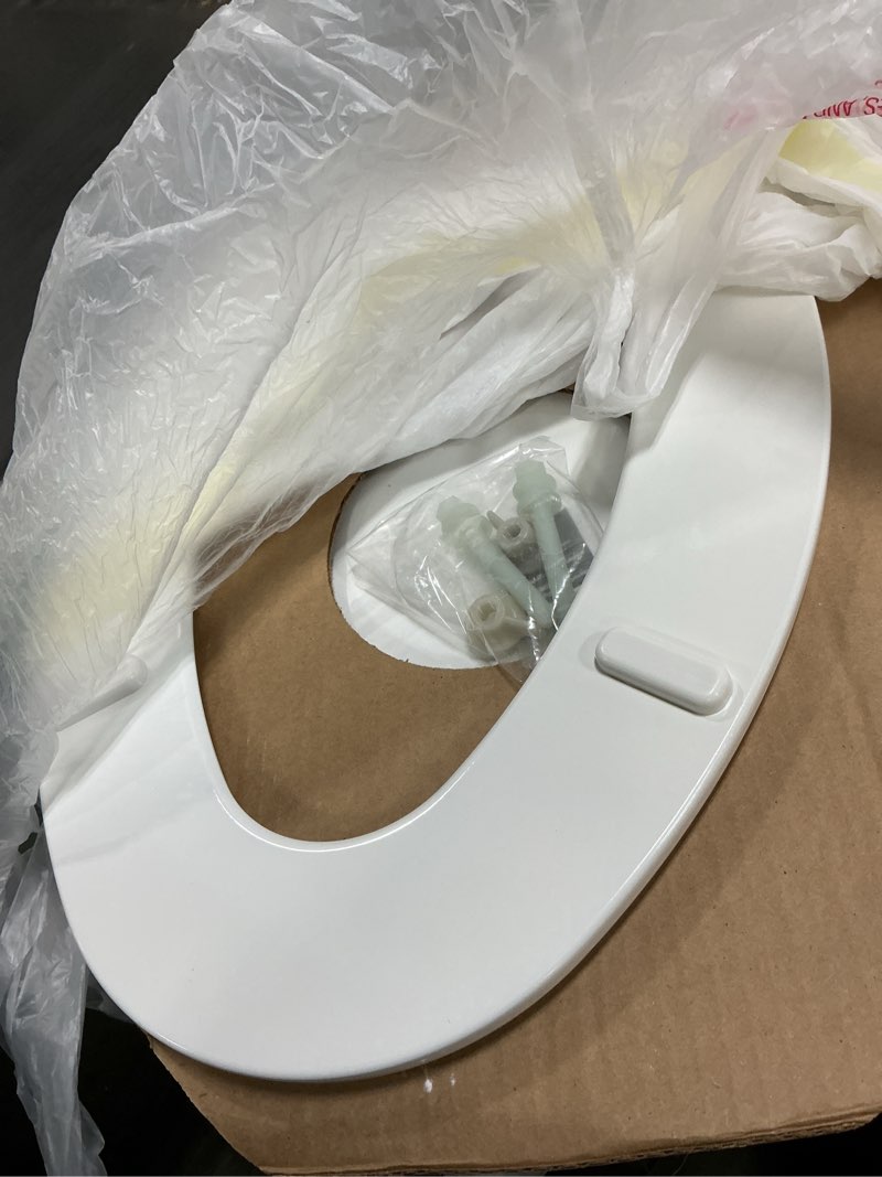 Condition photo showing As Is for mayfair linden slow close toilet seat, non slip heavy duty wood, easy install, elongated, white elongated traditional hinge