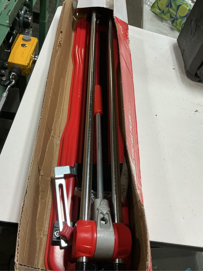 Condition photo showing As Is for rubi practic 61 plus-24 in. tile cutter with tungsten carbide blade and roller guide