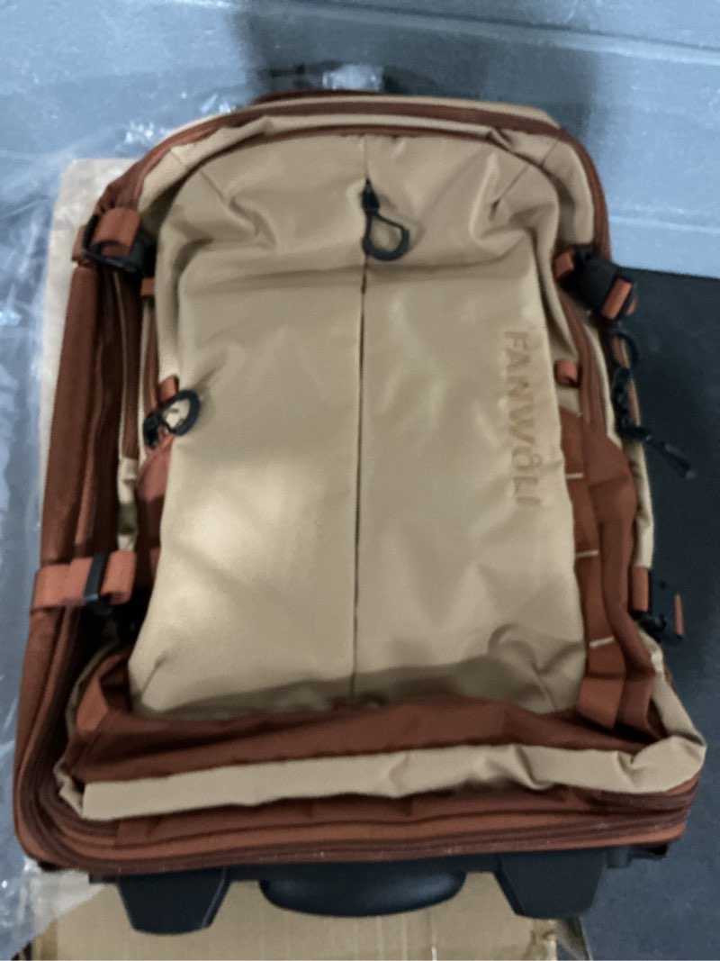 Condition photo showing Good Condition for fanwoli rolling vacuum backpack travel,one-button compression,55l,brown and peanut butter
