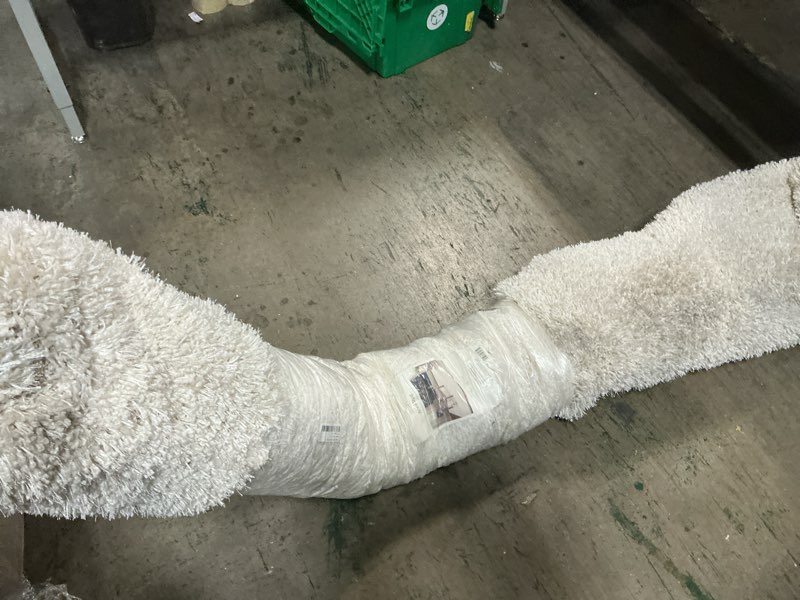 Condition photo showing As Is for 7'1"x10' solid eyelash woven shag rug cream - threshold™