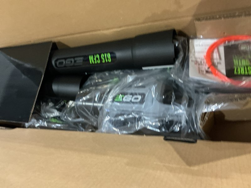 Condition photo showing As Is for ego power+ battery blower/trimmer kit (battery & charger)