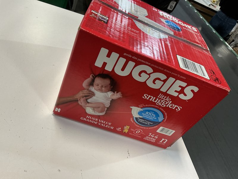 Condition photo showing New/Like New for Huggies Size Newborn Diapers, Little Snugglers Baby Diapers, Size Newborn (up to 10 lbs), 144 Count, Packaging May Vary