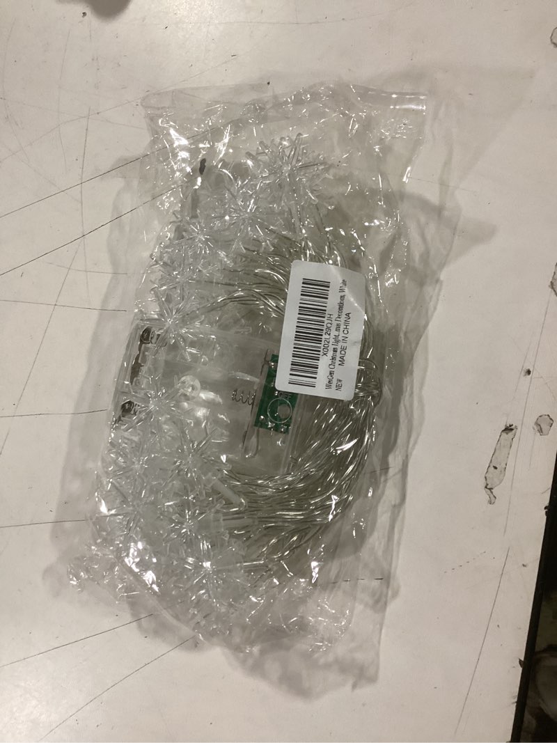 Condition photo showing Good Condition for WesGen Christmas Lights?Snowflake String Lights Battery Operated Waterproof 20ft, 40 LED Fairy Lights for Xmas Garden Patio Bedroom Party Decor Christmas Decorations, White