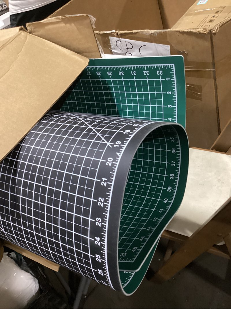 Condition photo showing Good Condition for pk00009 model gbm3042 series 30" x 42" professional cutting mat; double-sided green/black; self-healing; for graphic arts, hobbies, sewing, scrapbooking, and other cutting projects 43"l x 30"w