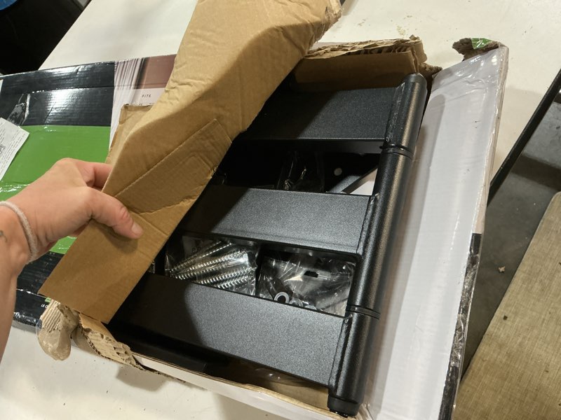 Condition photo showing As Is for full motion tv wall mount-it! with 40 in. extension for screens up to 70 in.