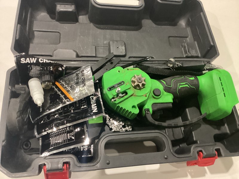 Condition photo showing As Is for USED Mini Chainsaw Cordless 6 Inch With 1 Batterie three chains Portable Small Electric Pruning saw for Wood Cutting,Tree Trimming, Garden & Household Use Stocking Stuffers Gift for Men Dad Husband 6 Inch-green-1 Battey+3 Chains+1 Guide Plates