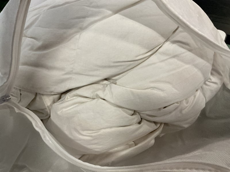 Condition photo showing As Is for ultra warm premium down comforter, twin, down