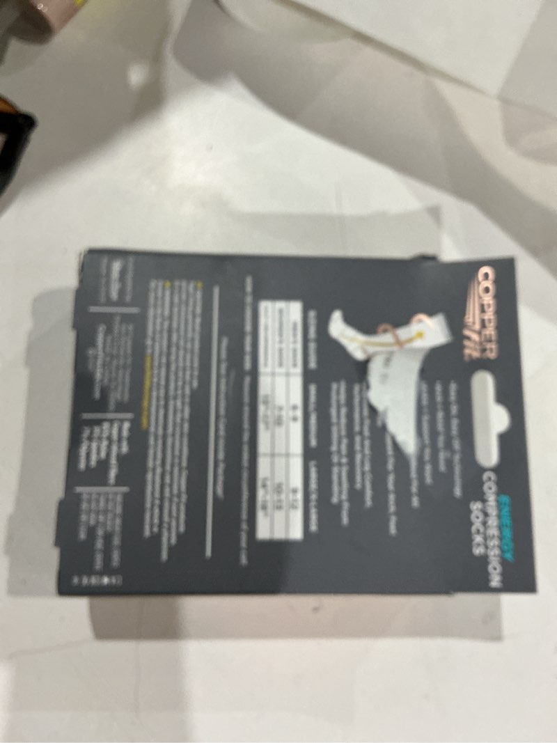 Condition photo showing Good Condition for copper fit energy compression socks with easy-on/easy-off technology, black, large/x-large, unisex
