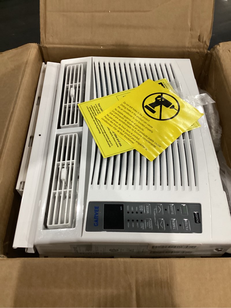 Condition photo showing As Is for garvee 6000 btu window ac unit with remote control, cools rooms up to 250 sq ft, 3 cooling & fan speeds quiet operation, digital display wifi, easy install kit, for bedroom, office 6000 btus white