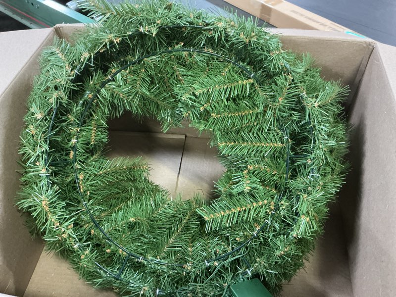 Condition photo showing Good Condition for National Tree Company 24 in Pre-Lit Norwood Fir Artificial Christmas Wreath, Christmas Decoration with 50 Clear LED Lights, 250 Tips, Timer, Green 24 in Christmas Wreath