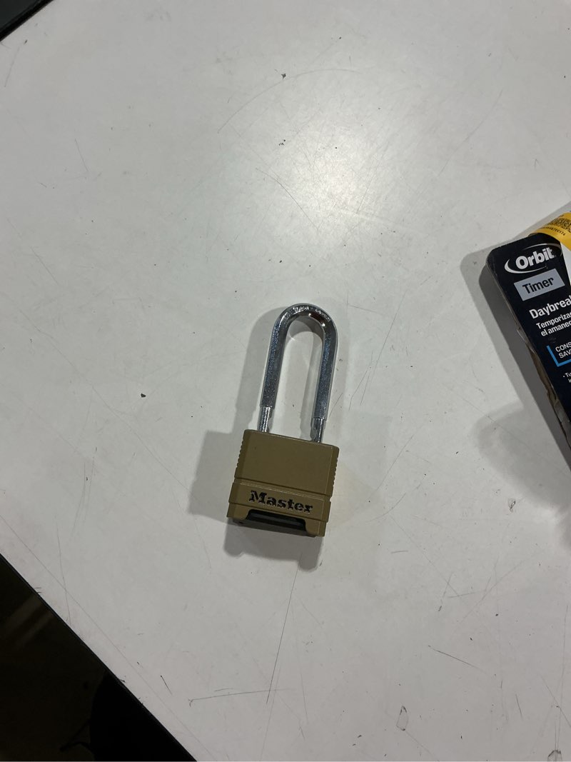 Condition photo showing As Is for master lock heavy duty outdoor resettable combination padlock, 2-1/4-in wide x 2-in shackle