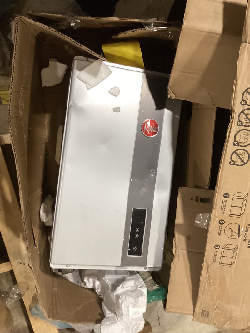 Condition photo showing As Is for rheem rtg-70dvln-3 high efficiency non-condensing indoor tankless natural gas water heater 7.0 gpm, 160,000 btus 7.0 gpm (standard) gray
