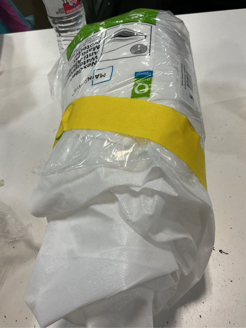 Condition photo showing As Is for mainstays nexgen waterproof anti-allergen zippered mattress protector  queen