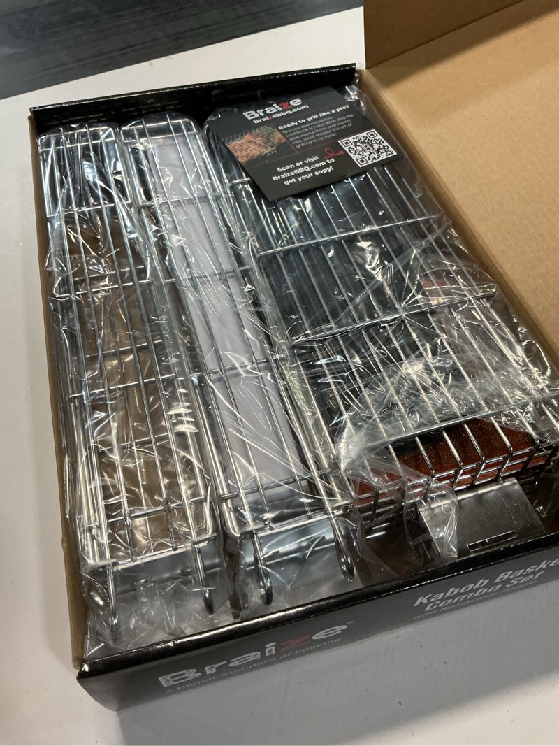 Condition photo showing Good Condition for Large Kabob Grilling Basket with Removable Handle. Stainless Steel construction with a Larger Capacity (12 x 2 x 2) and secure easy latch lid. (3-Piece Set – Bag & Sponges Included)